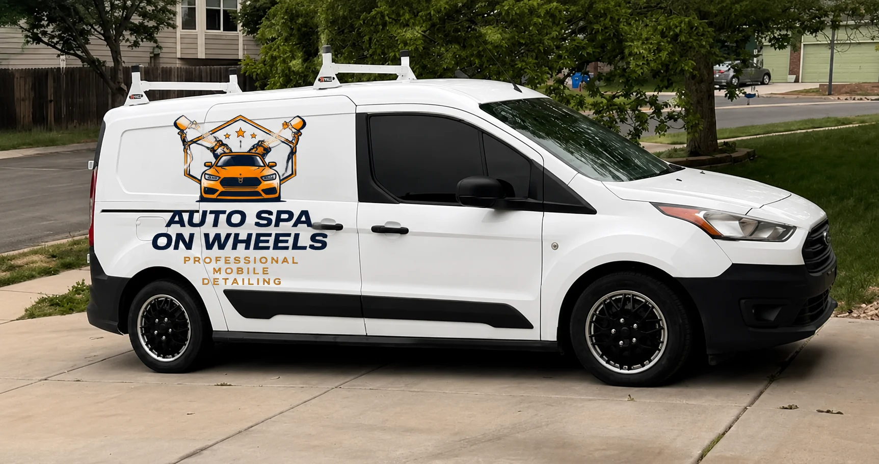 Auto Spa On Wheels branded mobile detailing van parked in a Colorado Springs driveway